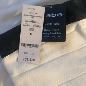 NWT Bebe cream and black peplum dress